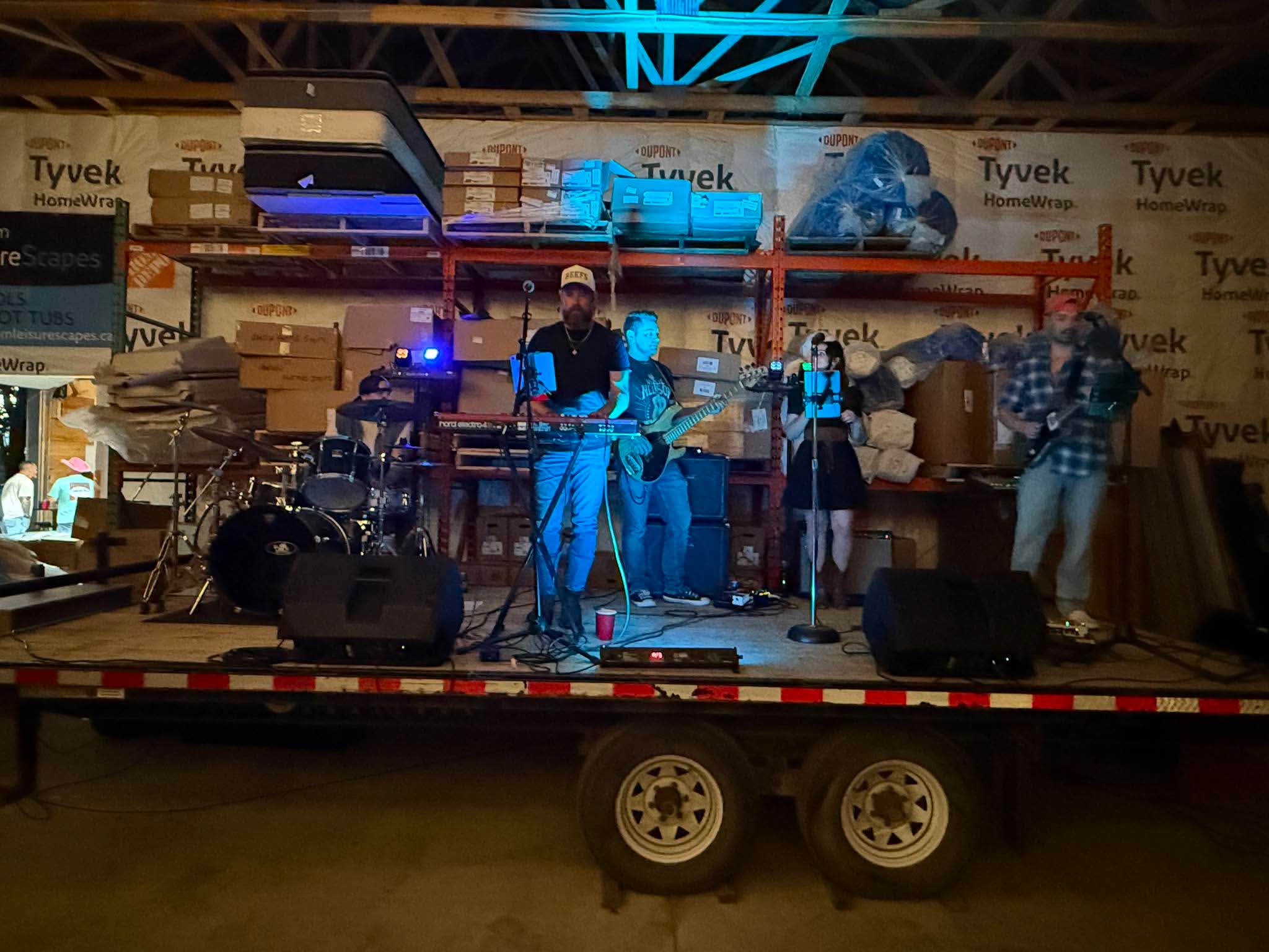 Live band performing at Custom LeisureScapes Customer Appreciation Night